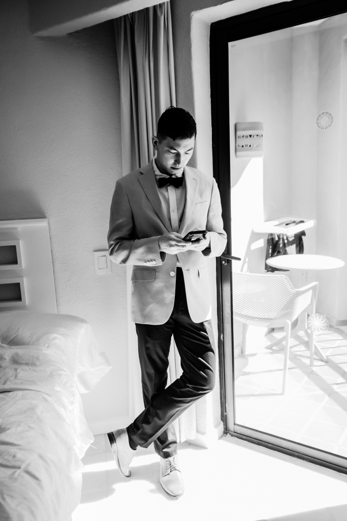 editorial photo of groom on wedding day in Mexico