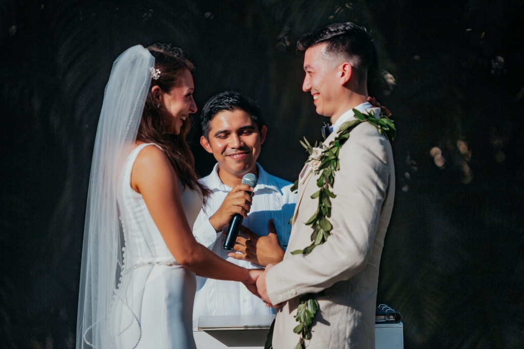 bride and groom exchanging vows during desitnation wedding in mexico