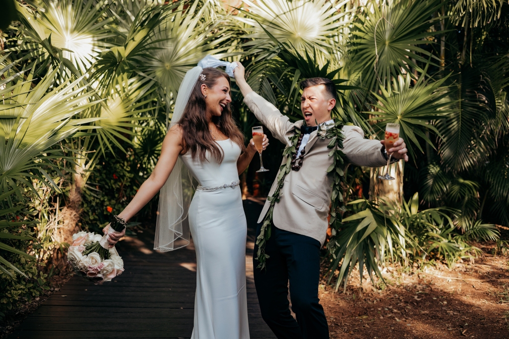bride and groom celebrating after wedding ceremony in Mexico