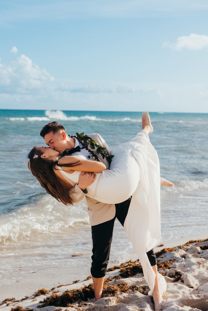 Bride and groom kissing in Mexico destination wedding